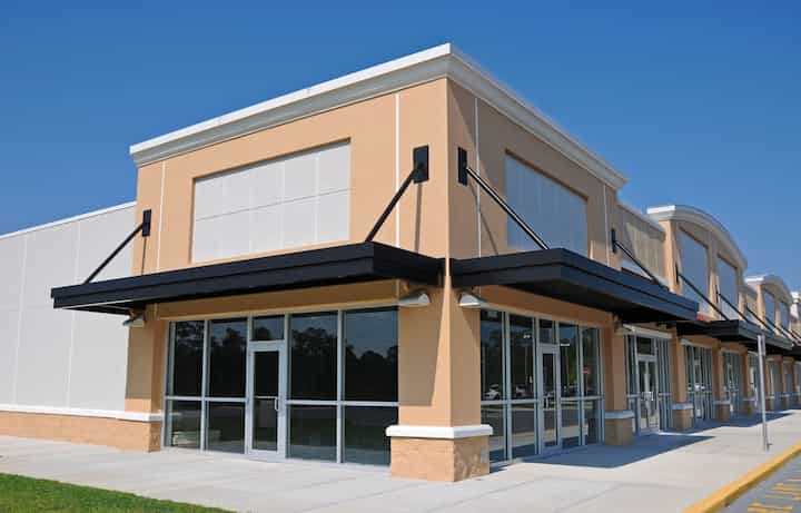 Bright red commercial awning in Wellesley, MA.