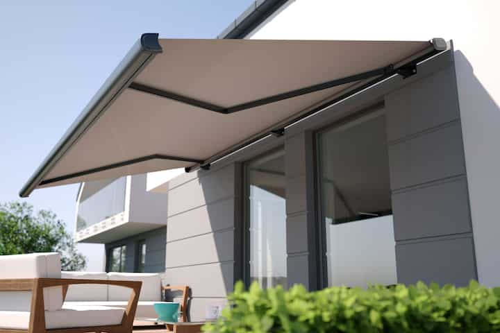 Beautiful residential awning enhances Wellesley, MA residence.